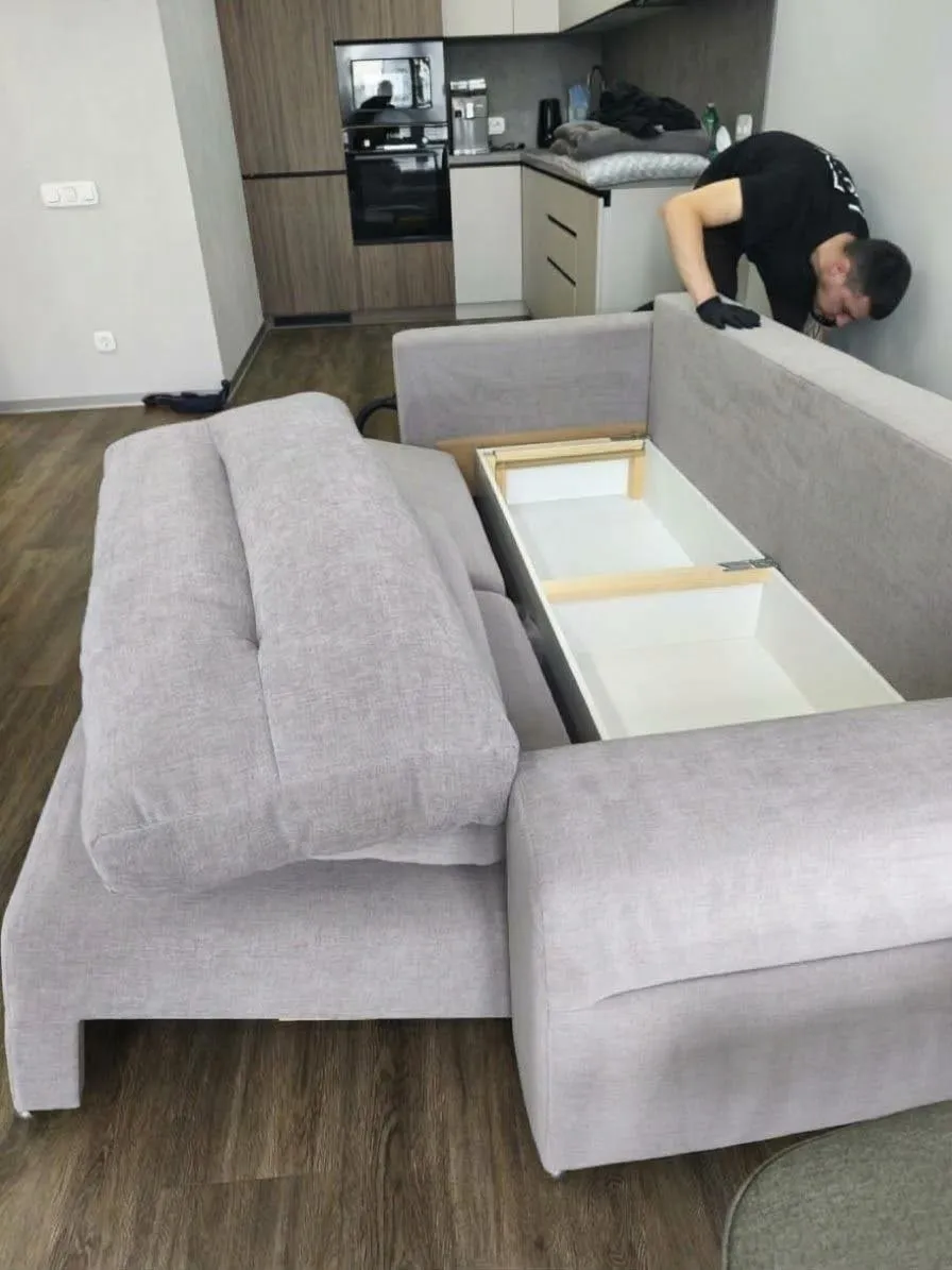 Cleanavy sofa cleaning: the sofa taken apart with the bedding box open, Seven residential complex
